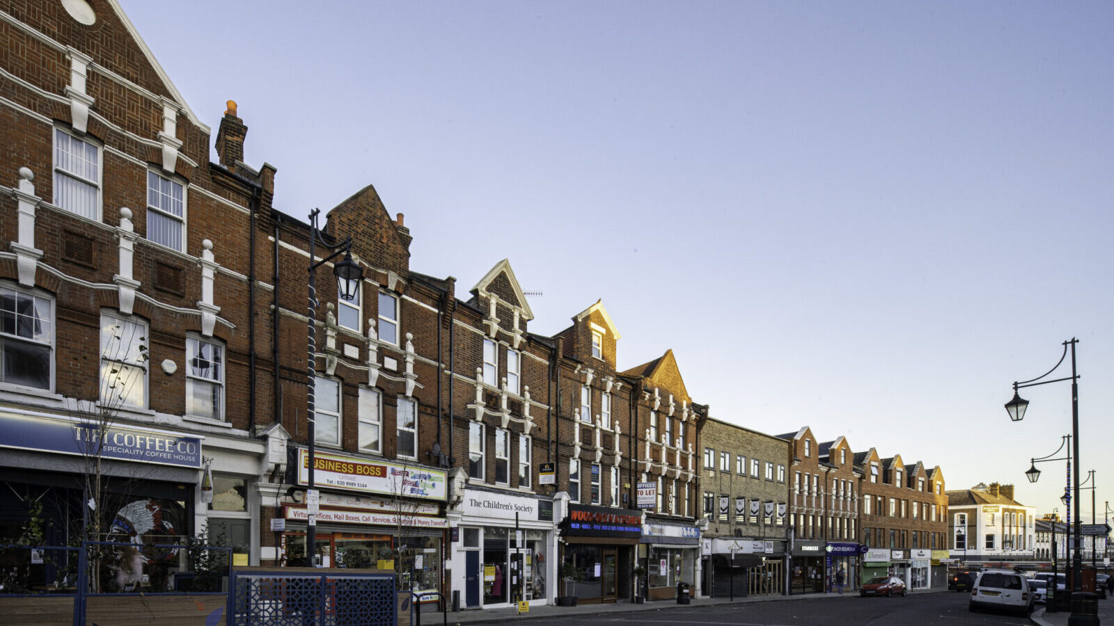 Shops and Victorian buildings along George Lane, South Woodford, where the Lincoln Homes office sits